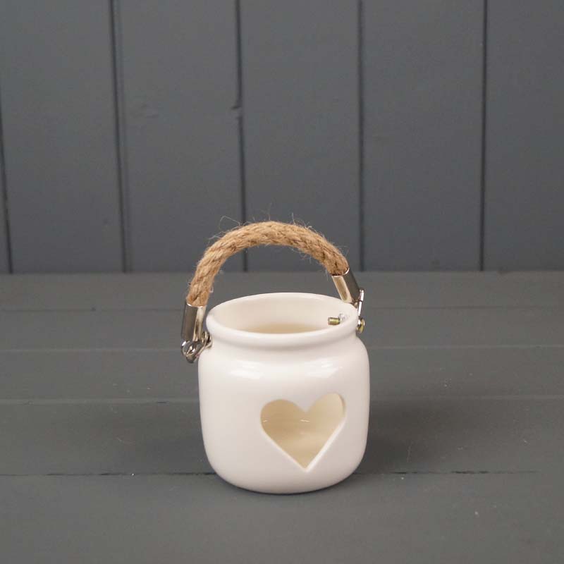 White Porcelain Tealight Holder with Rope Handle and Cut Out Heart detail page